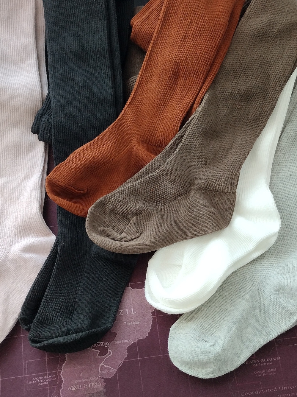 set of 6 soft ribbed knit children's tights in a variety of neutral Colors